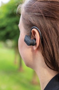 Logo trade liikelahjat tuotekuva: TWS urheilukuulokkeet latauskotelossa